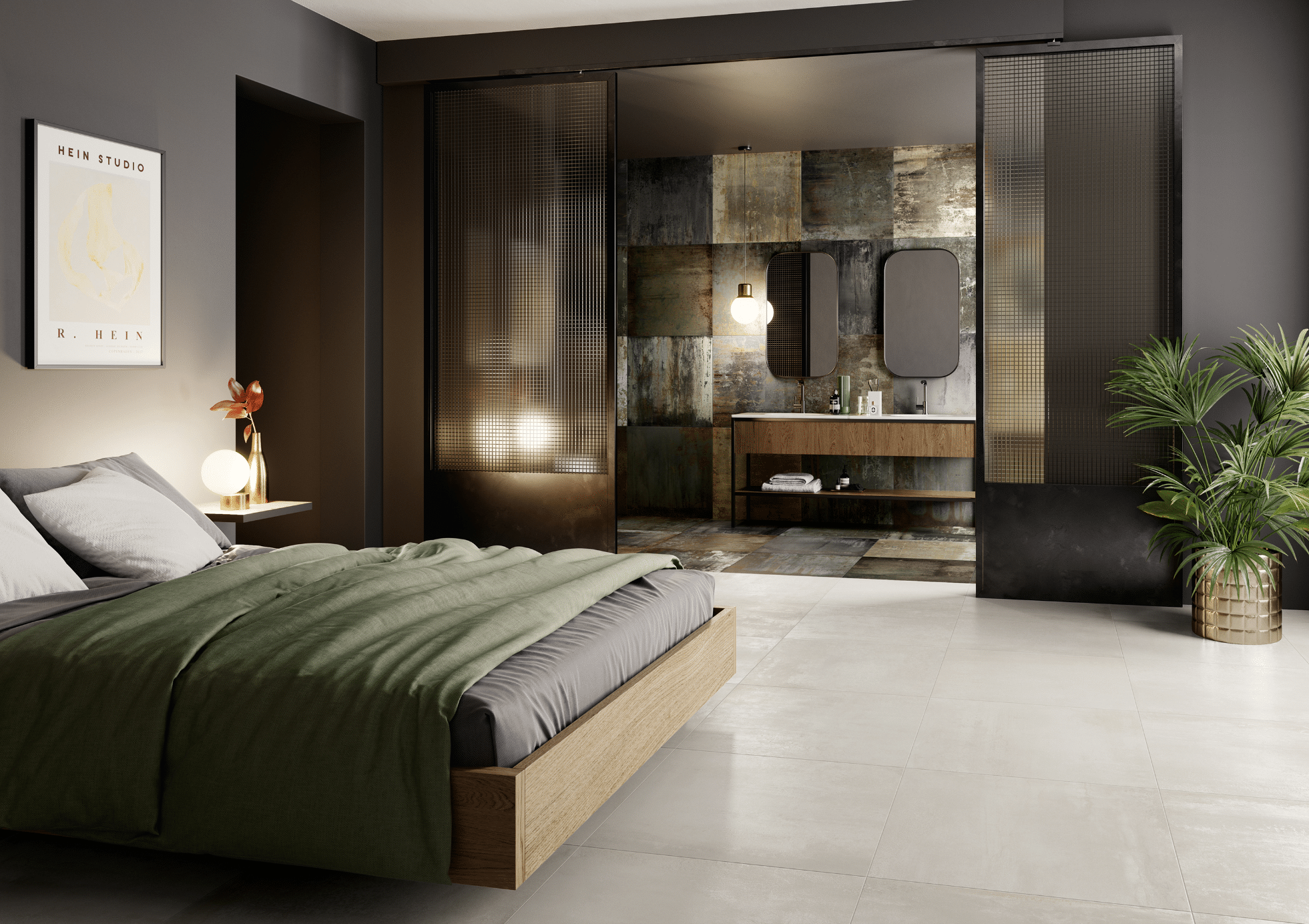 C. Bergmann zeigt ein Schlafzimmer mit hellem Fliesenboden, einem Bett aus Holz und dunklem Bezug mit Zugang zu einem Badezimmer mit Spiegeln von Monocibec.