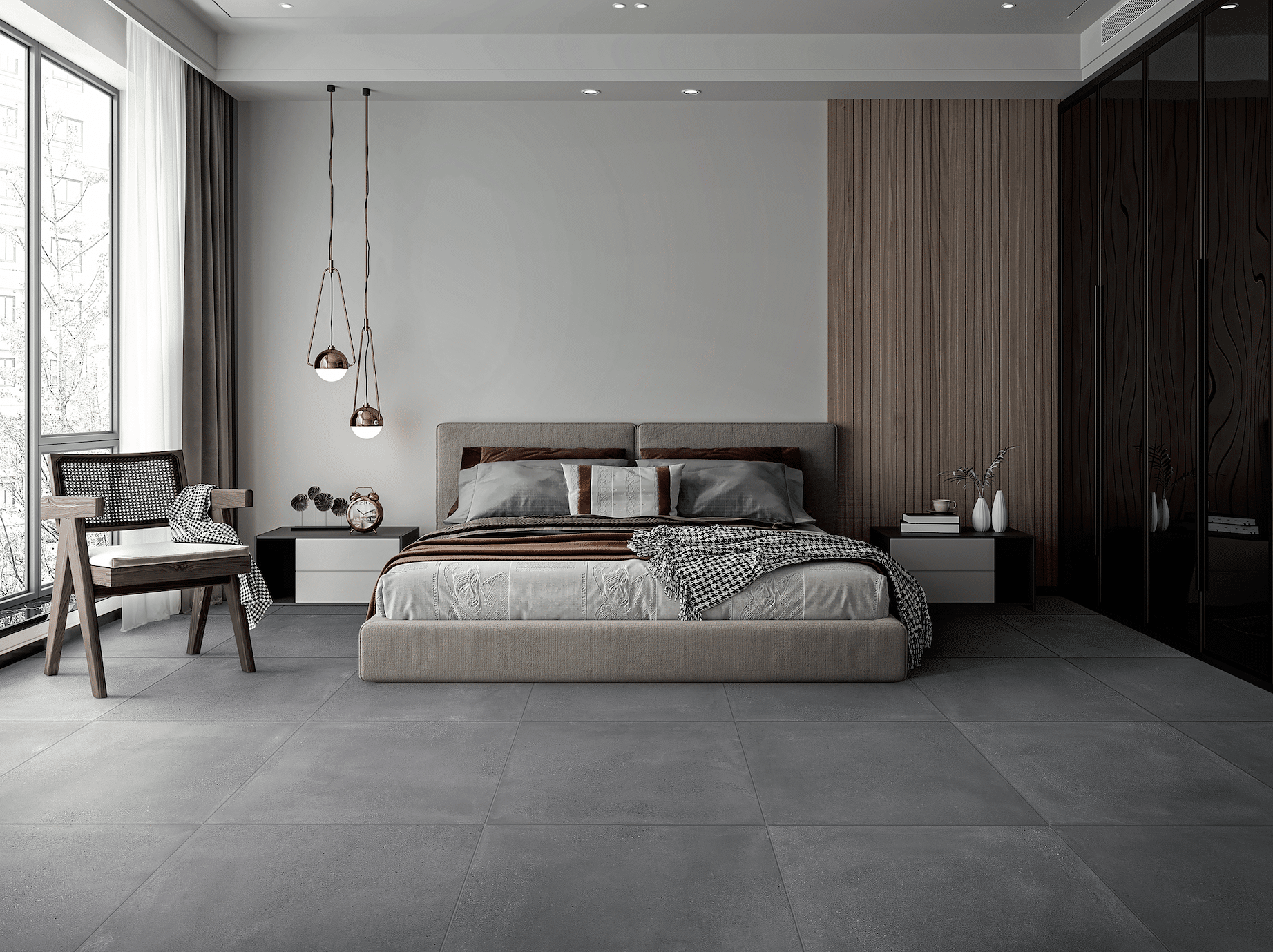 C. Bergmann zeigt ein Schlafzimmer in Naturtönen mit grauem Fliesenboden, beigem Doppelbett und einem gemütlichen Holzsessel von Abitare.