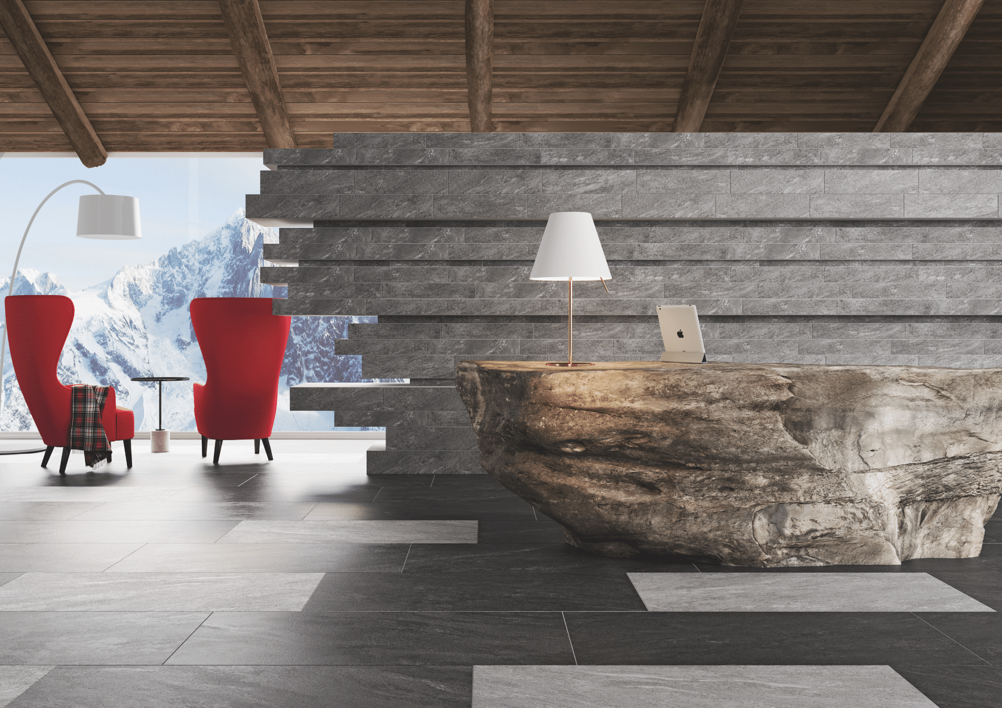 C. Bergmann zeigt einen Eingangsbereich mit Pult aus Stein und Fliesenboden in verschiedenen Grautönen und einen Sitzbereich mit roten Ohrensesseln von Agrob Buchtal.
