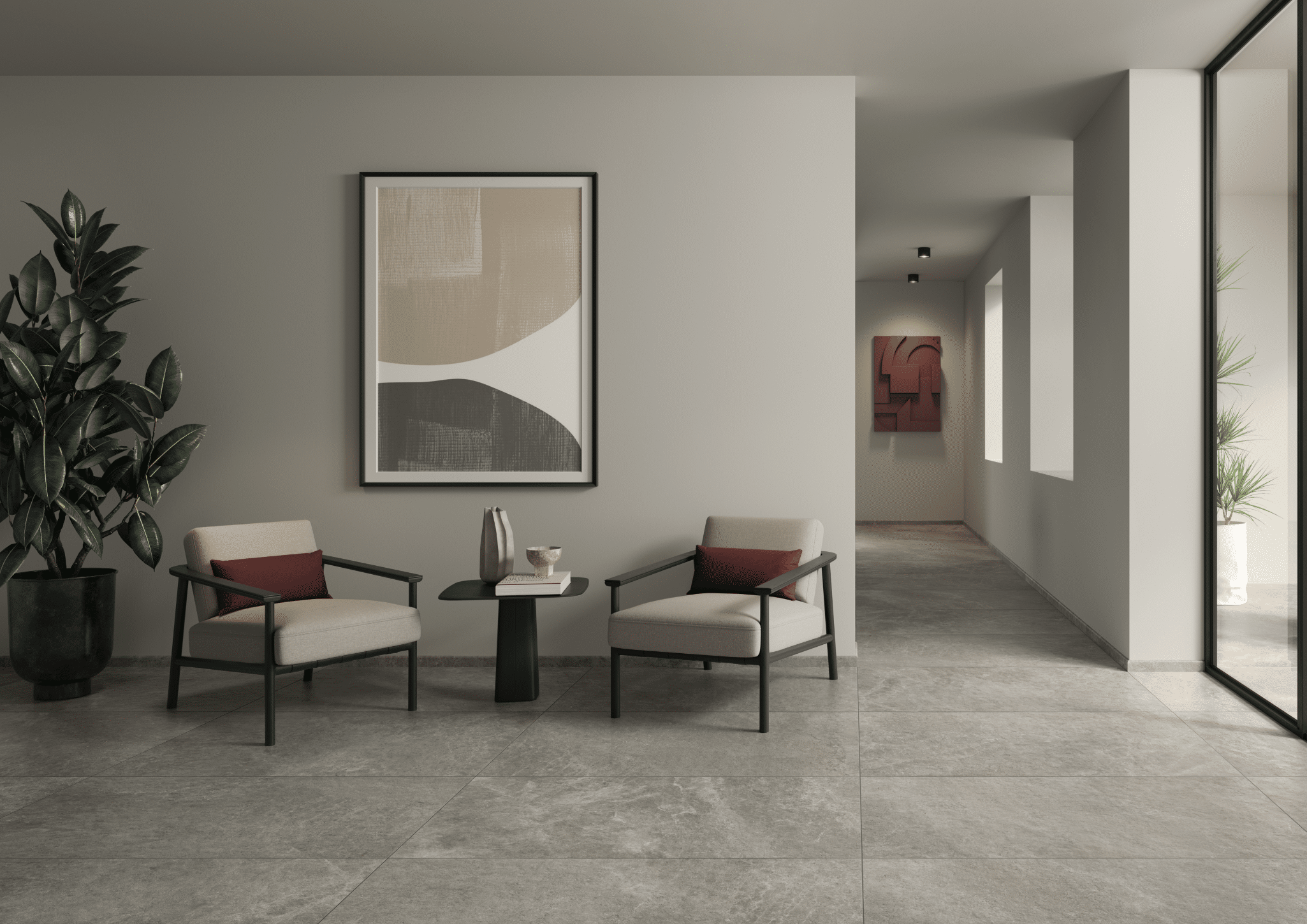 C. Bergmann zeigt einen Wartebereich mit marmoriertem Fliesenboden, gemütlichen Loungesesseln und einem schwarzen Beistelltisch von Villeroy & Boch.