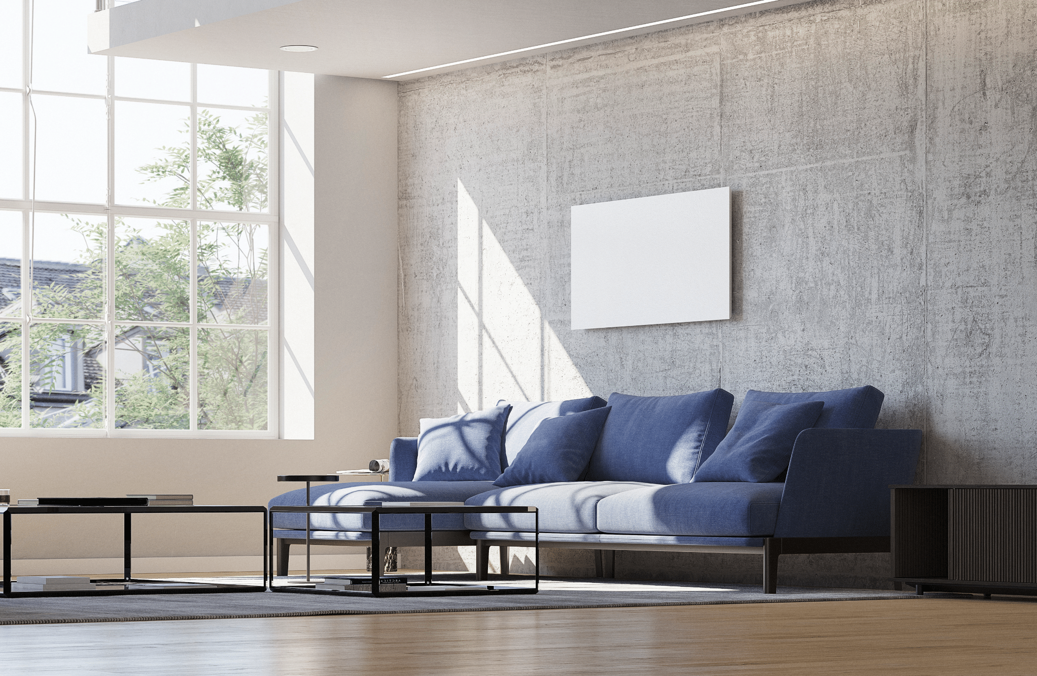 Dimplex zeigt ein großes Wohnzimmer im Industrial Style mit einem großflächigen Fenster mit weissen Rahmen und einer Betonwand, blauer Sitzlandschaft und Holzboden mit verlegter Fussbodenheizung.