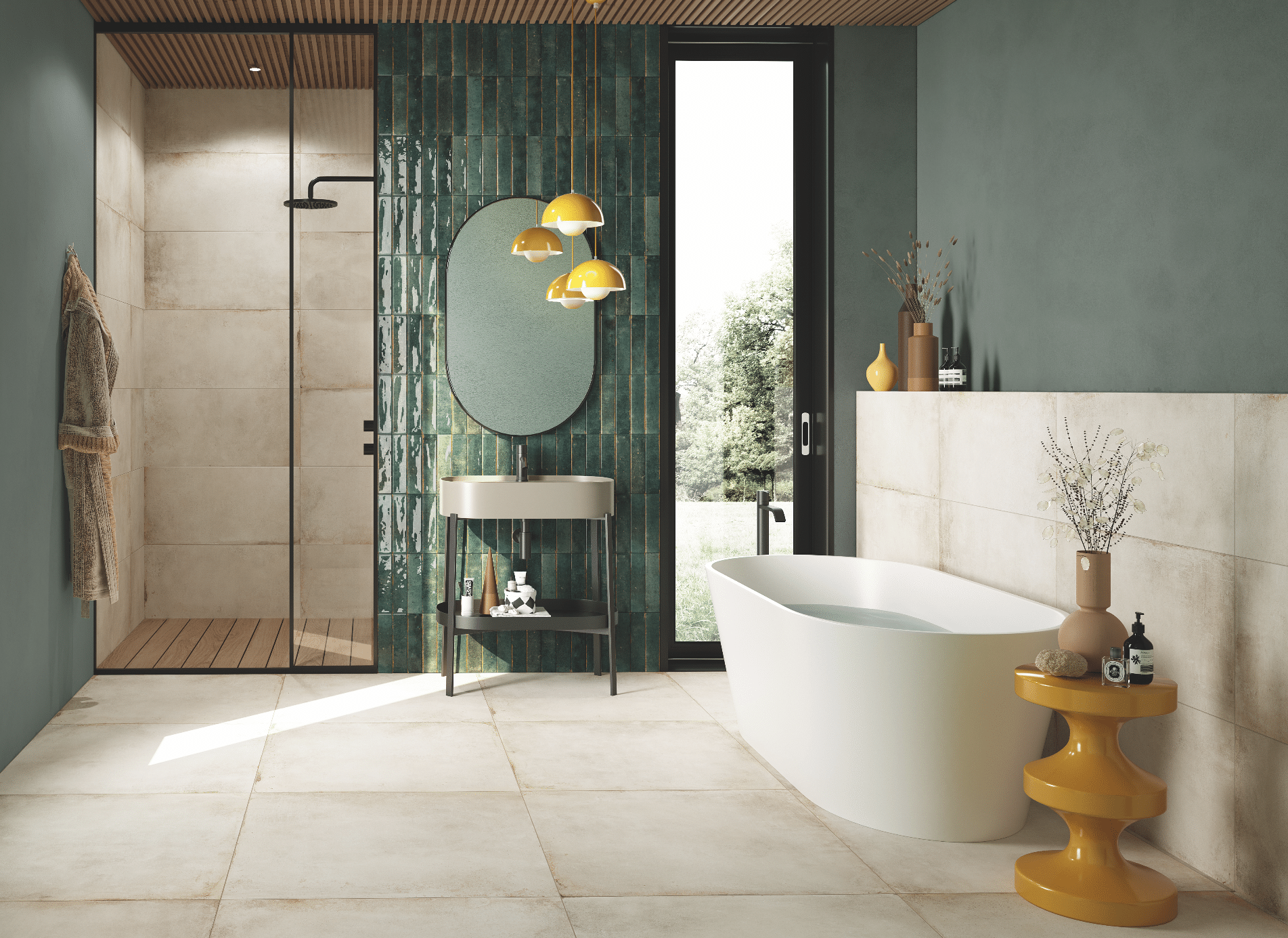 Fliesendorf zeigt ein Badezimmer mit hellem Fliesenboden und freistehender Badewanne in weiss mit einem Waschtisch und großem Spiegel vor einer grünen, gefliesten Wand.