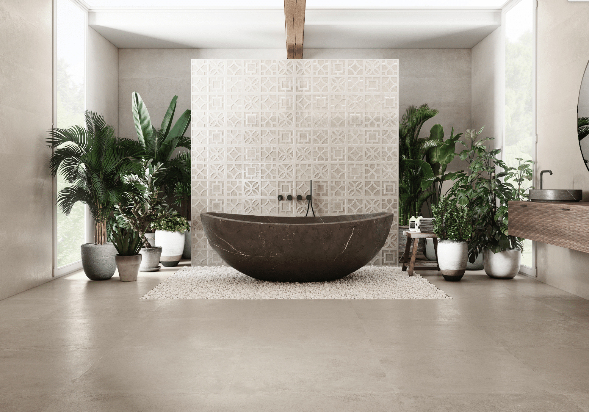Fliesendorf zeigt einen Wellnessbereich mit hellen XXL-Fliesen und einer dunklen, marmorierten, freistehenden Badewanne mit vielen Pflanzen und einem Waschtisch aus Holz.