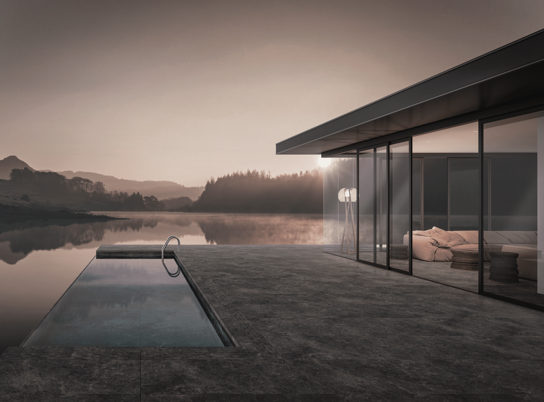 Fliesendorf zeigt eine dunkel, geflieste Terrasse mit Infinity Pool in einem See und Zugang durch die Schiebetür zum Wohnzimmer mit großer Glasfront und brauner Couch.