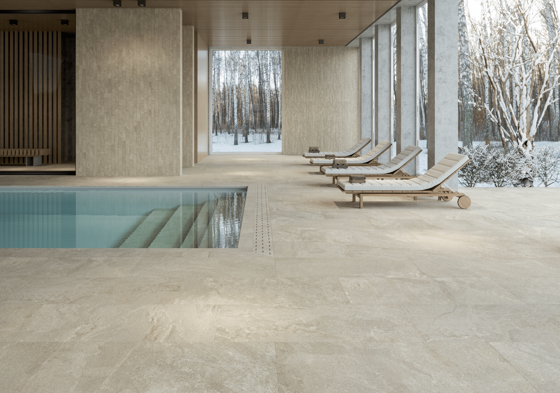 Fliesendorf zeigt einen hellen Wellnessbereich mit Fliesenboden und großem Pool und Holzliegen daneben, die zum Entspannen einladen.