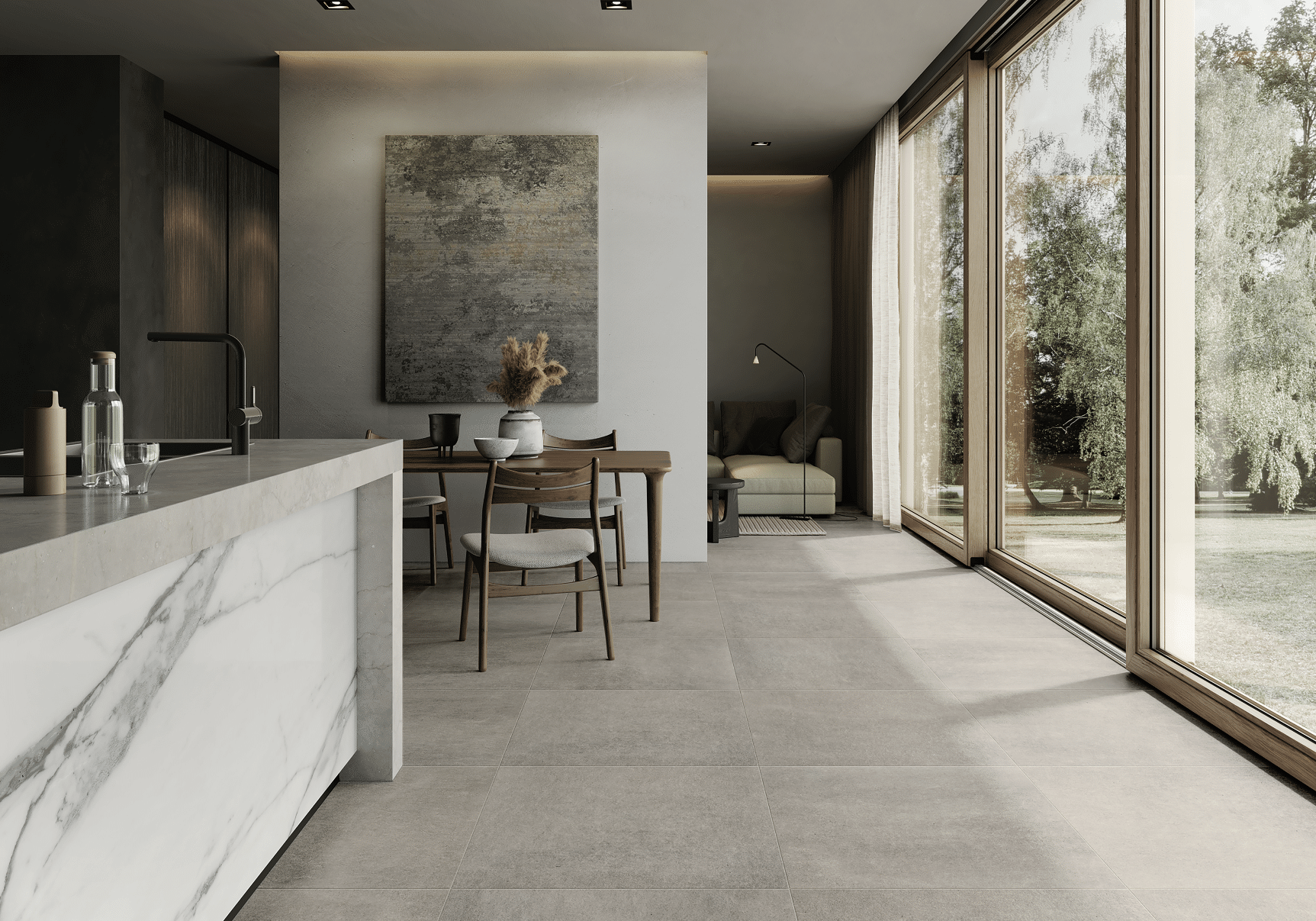 Fliesendorf präsentiert die XXL-Fliesen in Steinoptik am Boden einer offenen Küche mit Keramikküche in Marmoroptik und langer Glasfront.