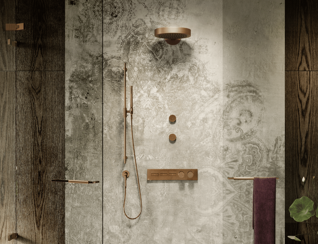 GESSI zeigt eine begehbare Dusche mit bronzener Armatur an der Wand in Betonoptik mit Glaswand.