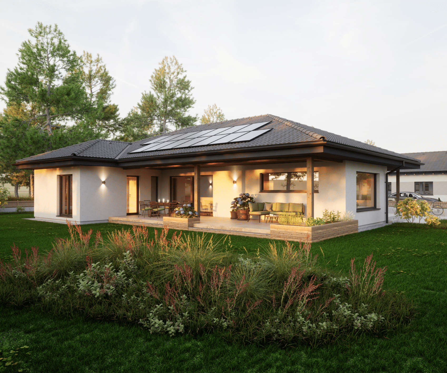 HARTL HAUS zeigt einen modernen, weißen Bungalow mit dunklem Dach, dunklen Türrahmen, Terrasse und Hochbeet.