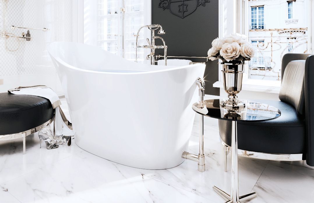 Jörger zeigt ein exklusives Badezimmer mit weißem Marmorboden, ausgestattet mit einer freistehenden Badewanne und luxuriösen Armaturen.