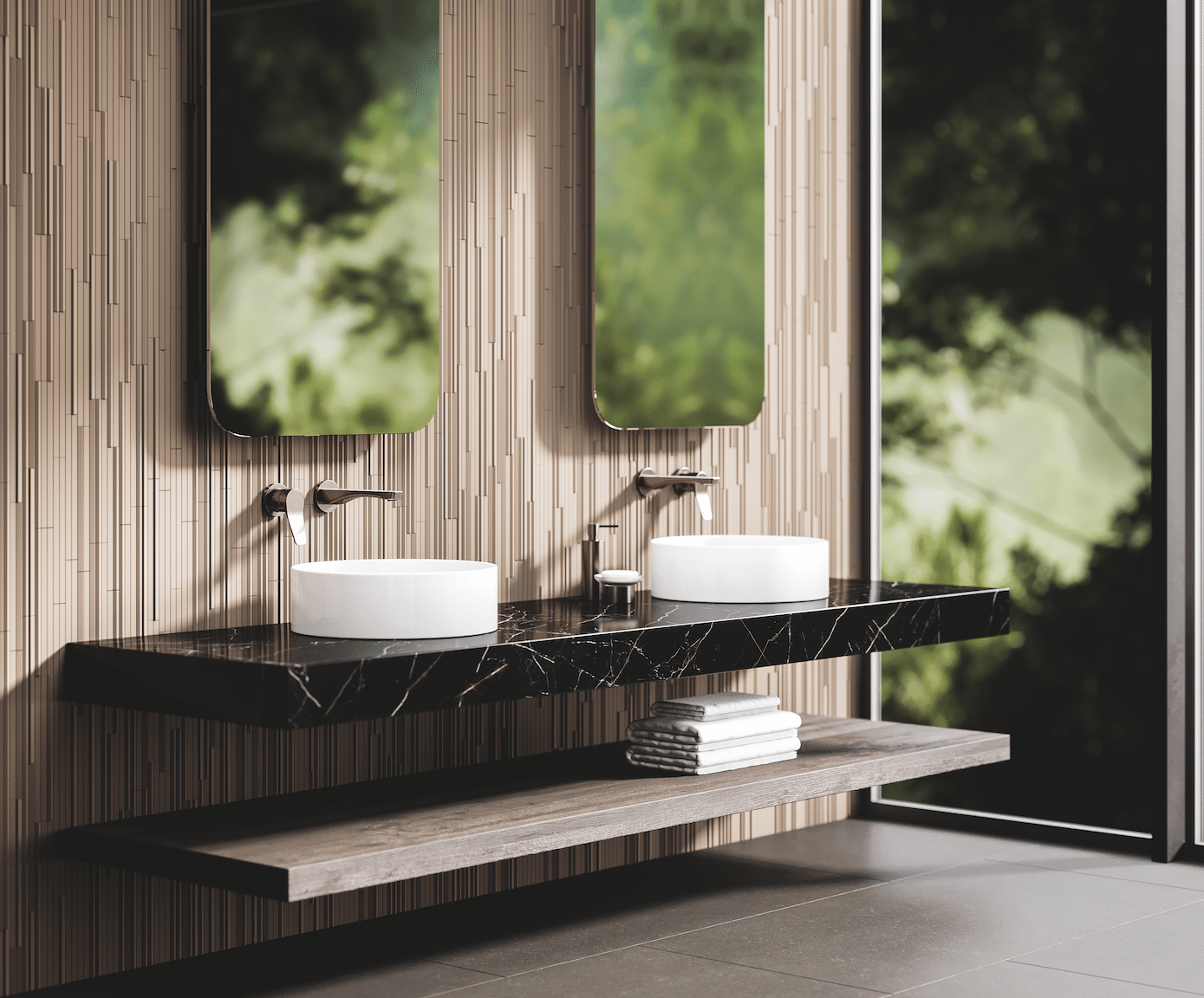 Jörger zeigt ein Badezimmer mit einem schwarzen, marmoriertem Waschtisch und weissen, runden Waschbecken mit matten Armaturen in Nerz.