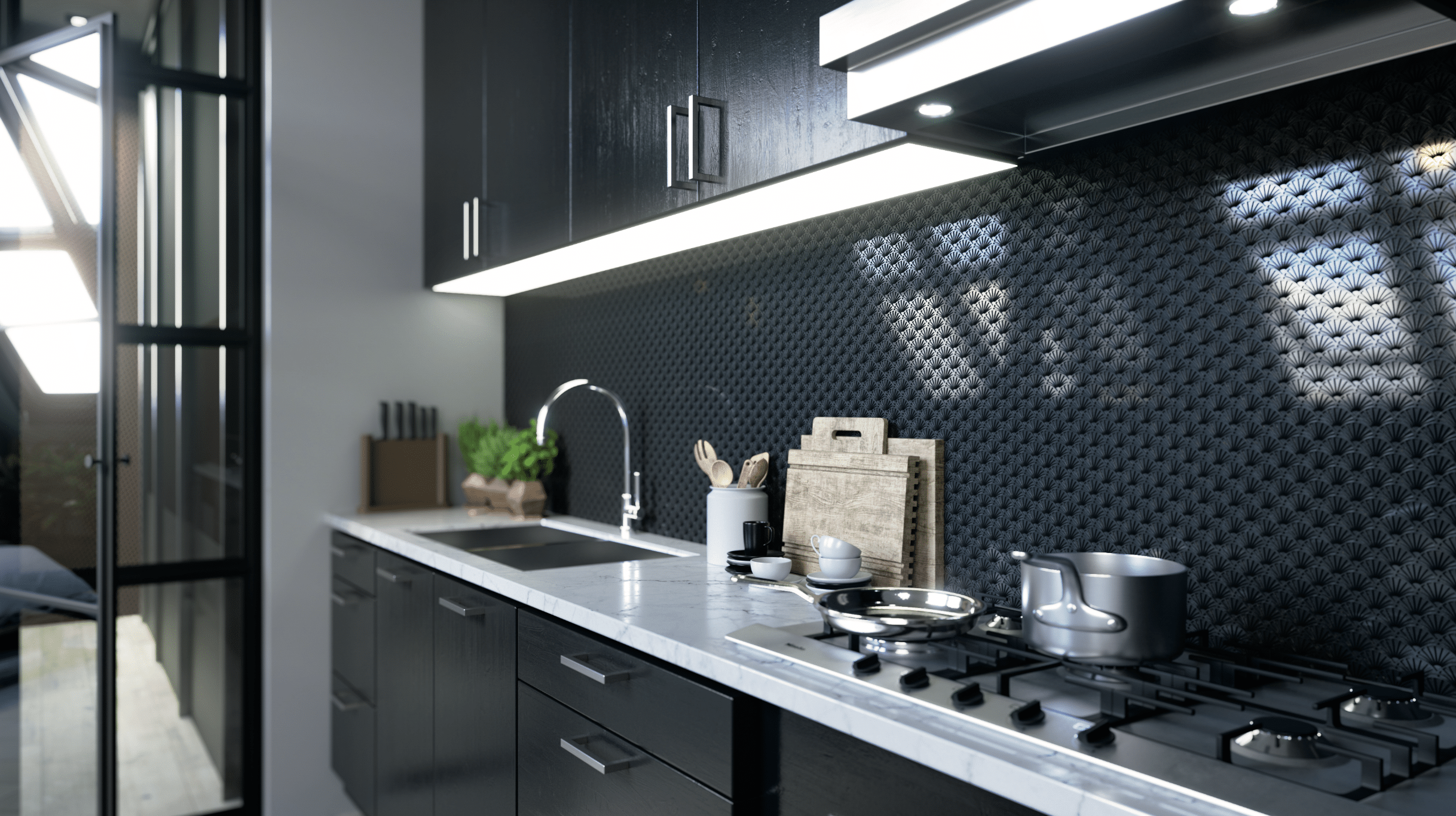 Keplinger zeigt eine Küche mit schwarzer Küchenzeile, marmorierter Arbeitsplatte und einer Rückwand mit Muster, dass durch Laserschnitt entstanden ist.