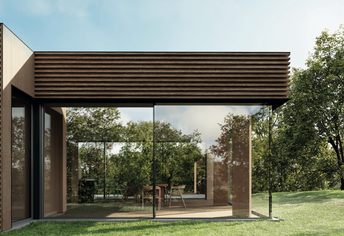 Solarlux zeigt ein modernes Holzhaus mit Flachdach und rundum verglastem Wintergarten für viel natürlichen Lichteinfall und Sicht auf den gepflegten Garten.